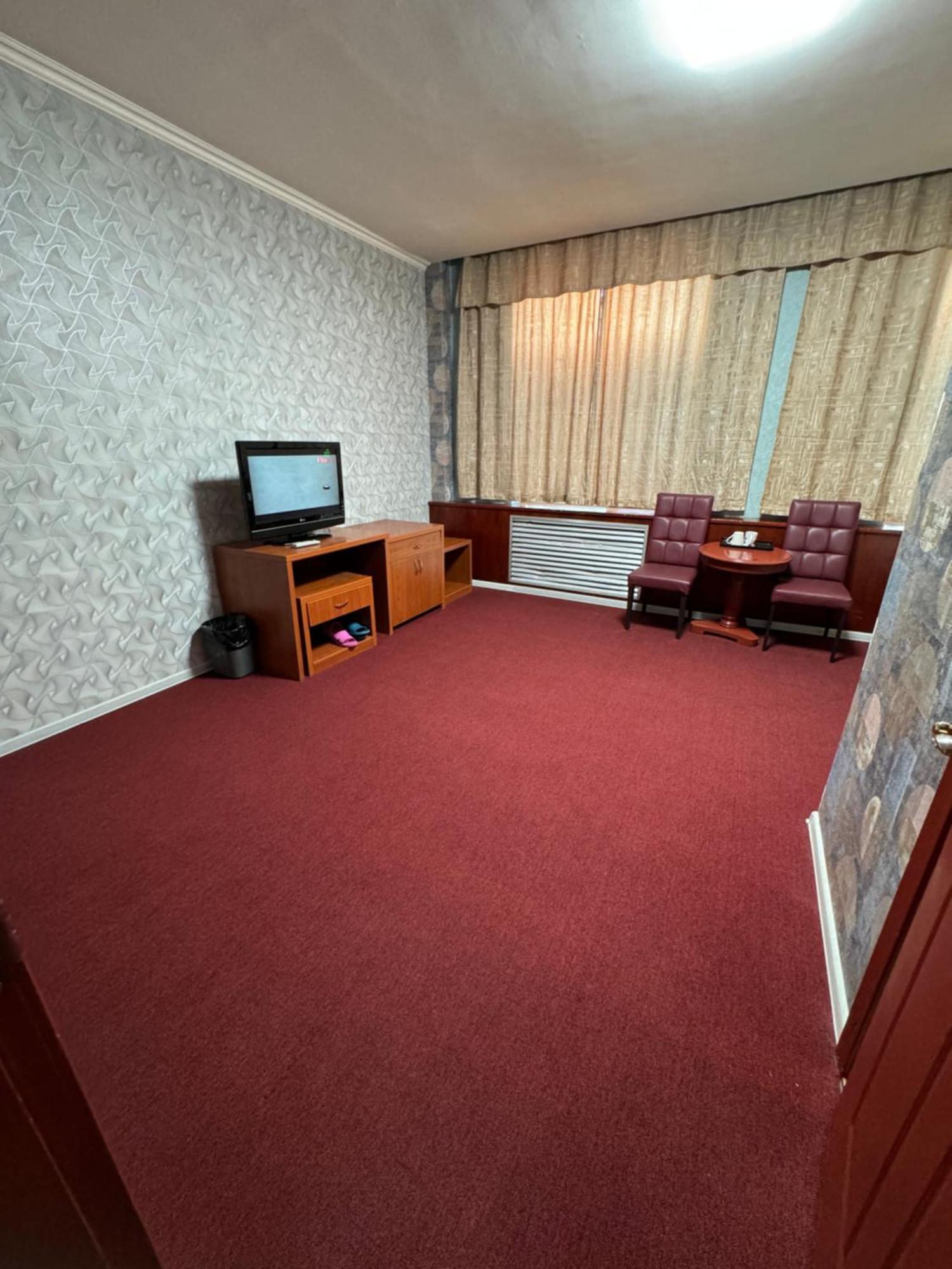 Zolotoi Drakon Hotel อัลมาตี ภายนอก รูปภาพ