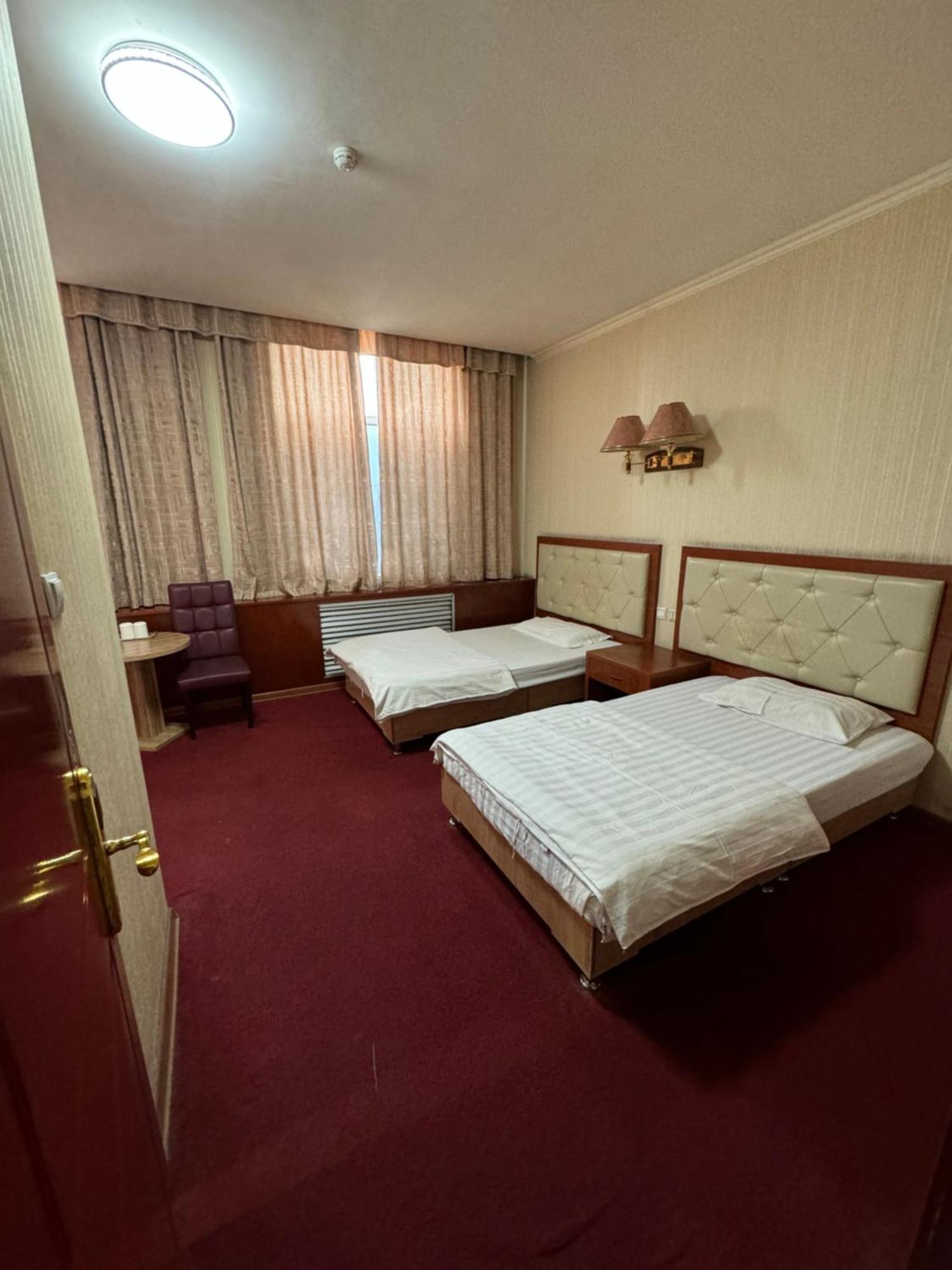 Zolotoi Drakon Hotel อัลมาตี ภายนอก รูปภาพ