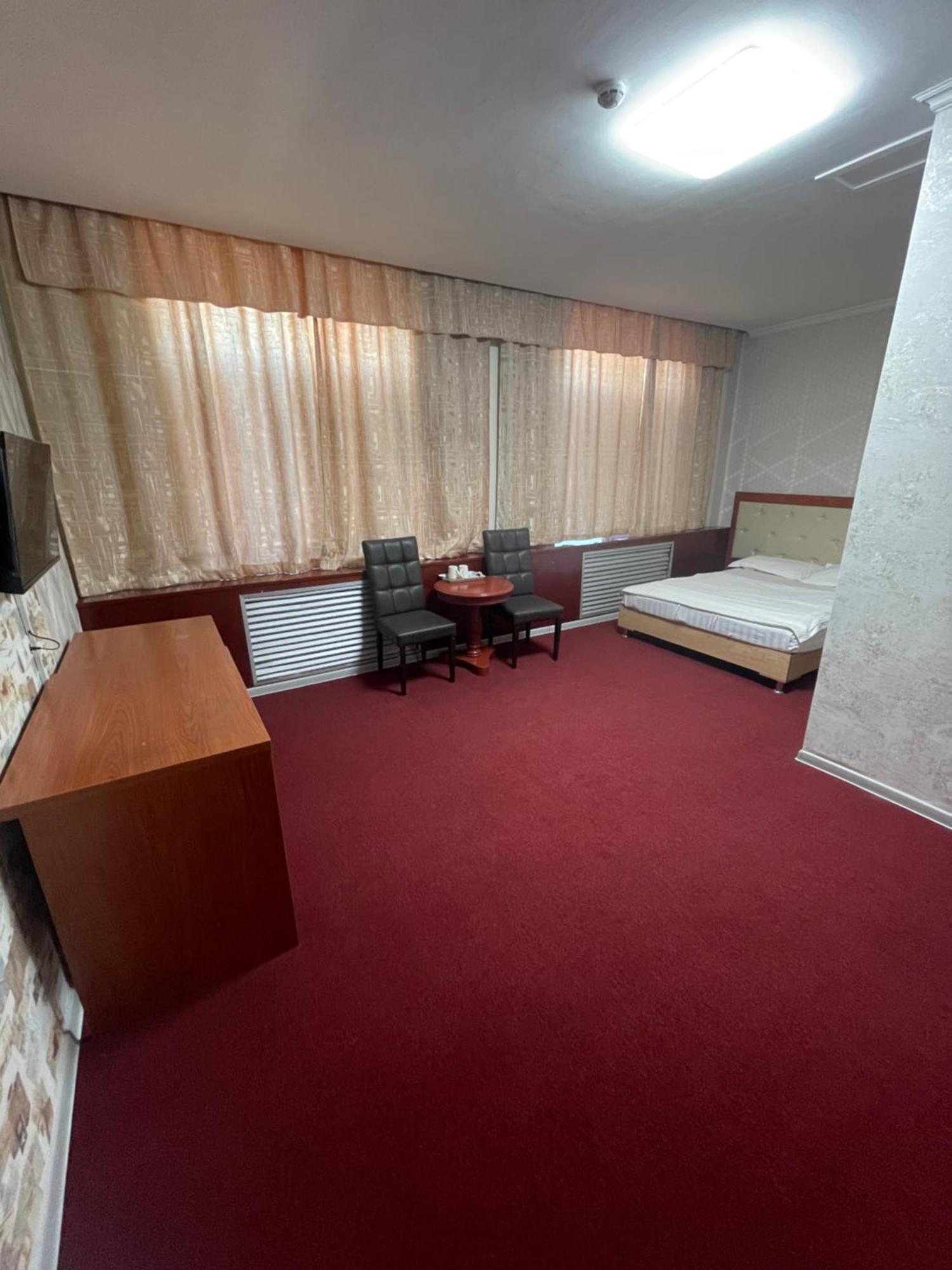 Zolotoi Drakon Hotel อัลมาตี ภายนอก รูปภาพ