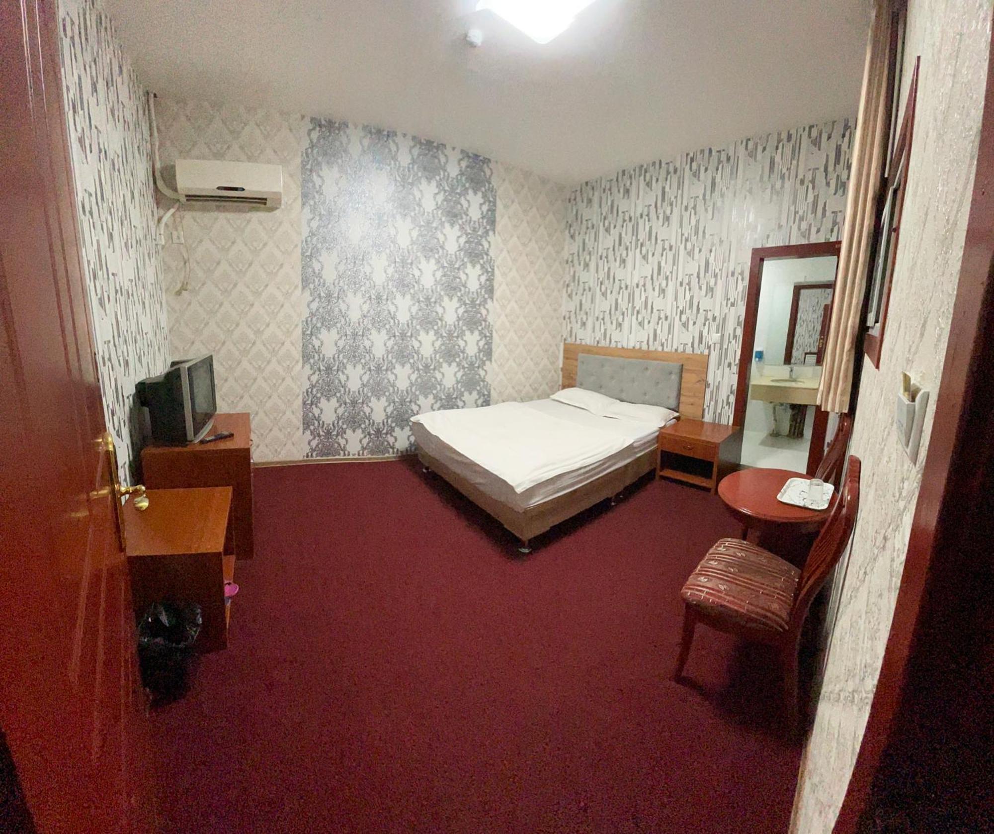 Zolotoi Drakon Hotel อัลมาตี ภายนอก รูปภาพ